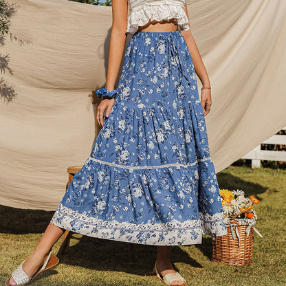 Damesrok met bloemenprint en vloeiende snit - Evi