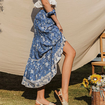 Damesrok met bloemenprint en vloeiende snit - Evi