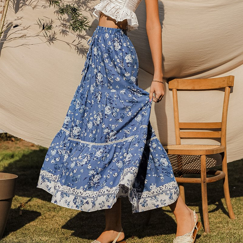 Damesrok met bloemenprint en vloeiende snit - Evi