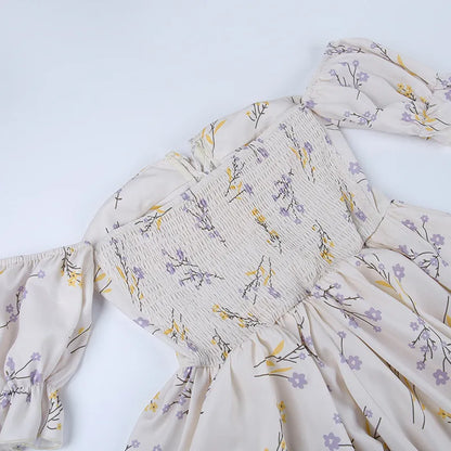 Nancy - Bloem uitgesneden kleine wikkeljurk