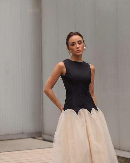 Vera - Mouwloze midi-jurk met rits en ruches