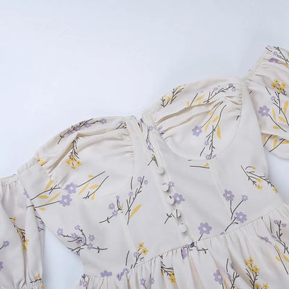 Nancy - Bloem uitgesneden kleine wikkeljurk