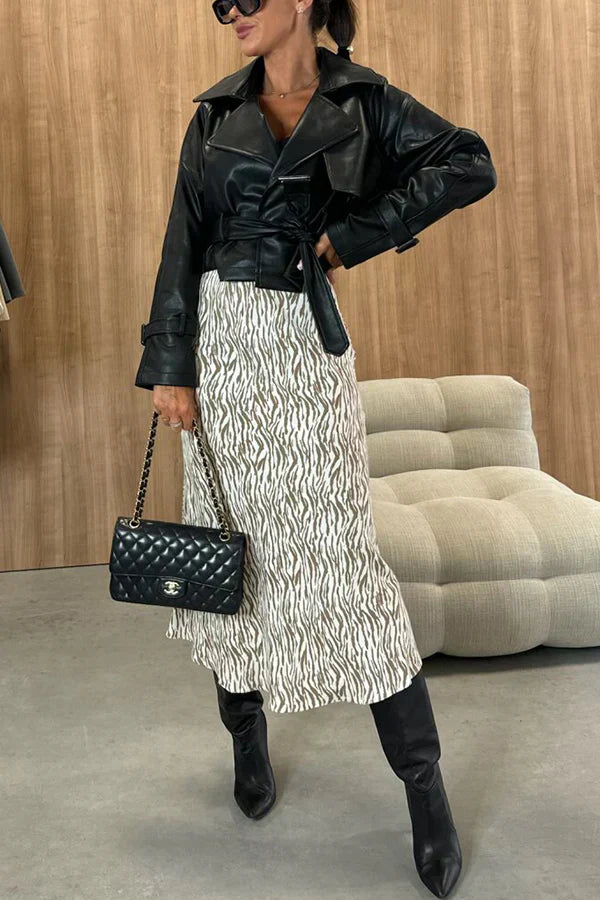 Afslankende rok met hoge taille en gedurfde en chique dierenprint, perfect voor een gedurfde en modieuze look